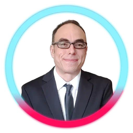 A picture of the founder of styleking.biz in a suit and tie smiles at the camera.